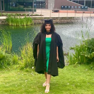 Libby Taylor-Griffiths in a graduation robe