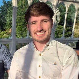 Headshot of Rollo Harrison - Geography alumnus