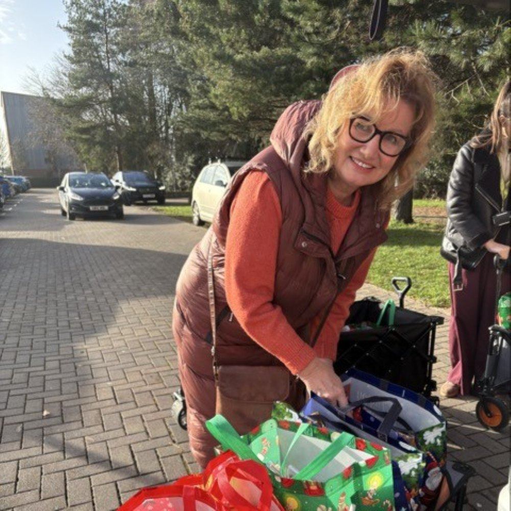 Heather O'Brien outside with hampers