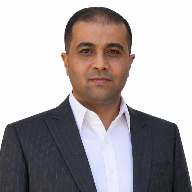 A headshot of Tariq Alsboui