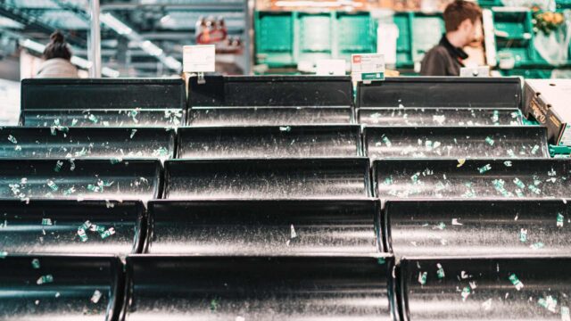 image of empty fruit and veg section in a supermarket