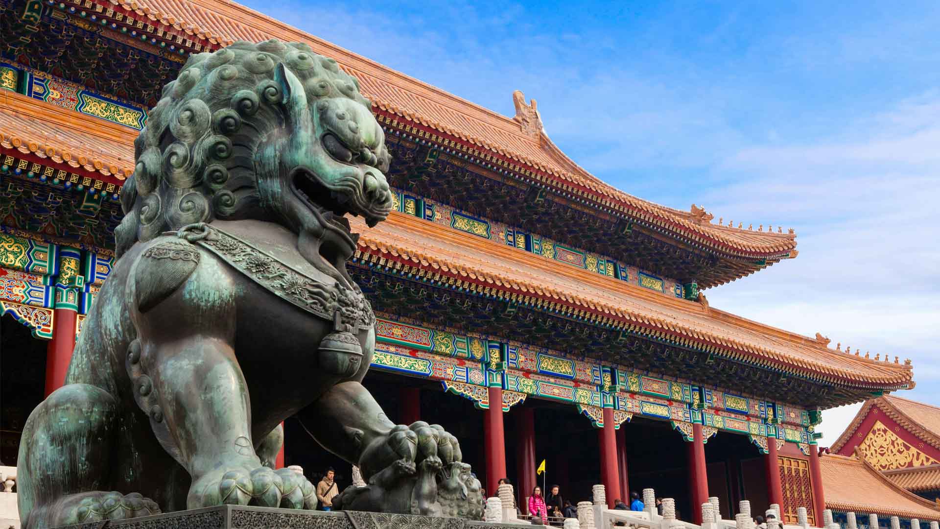Picture showing a lion statue in front of a temple in Beijing China