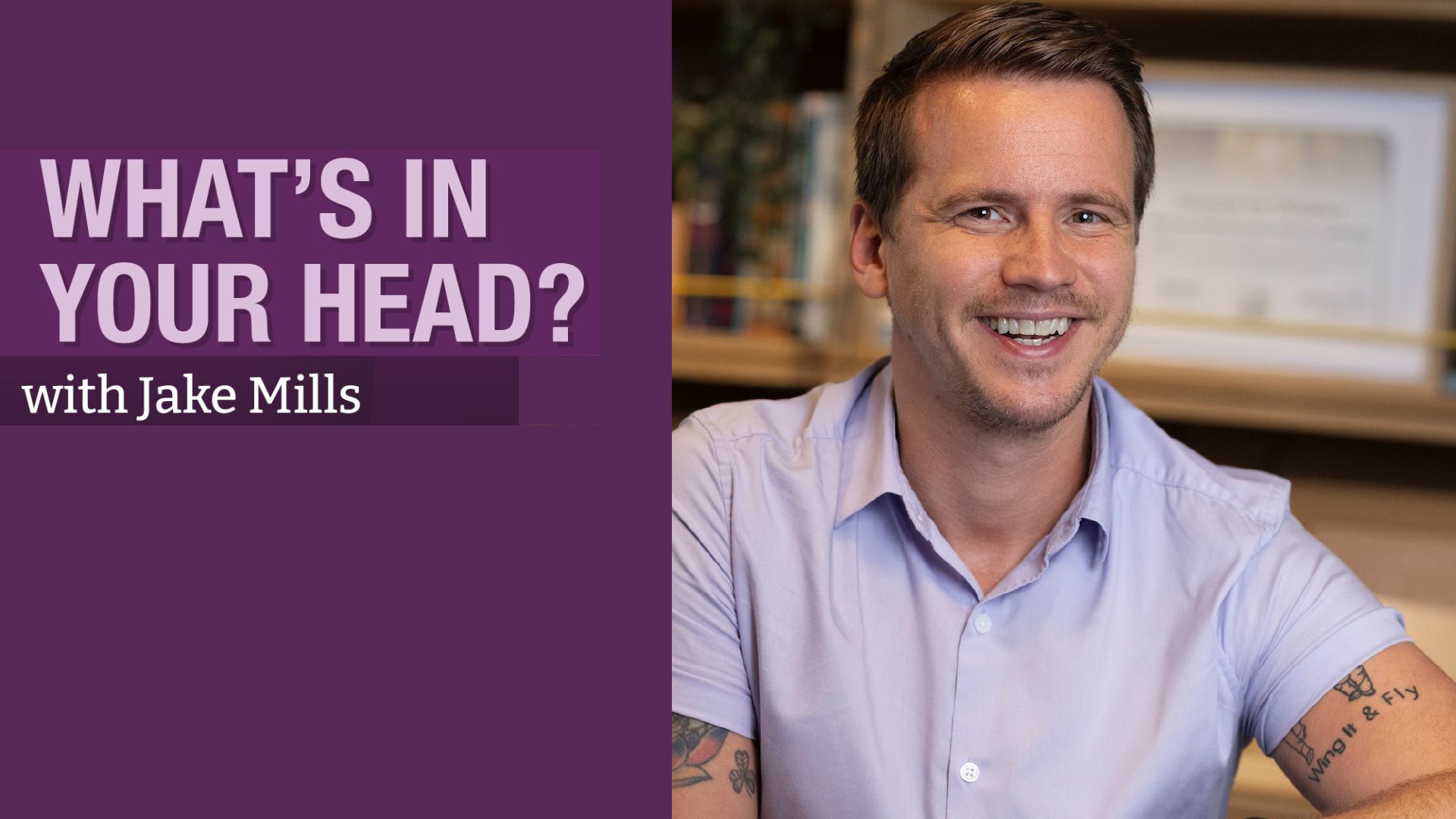 A photo of Jake Mills wearing a purple, short-sleeved shirt and graphic text on the left that says, "What's in your head".
