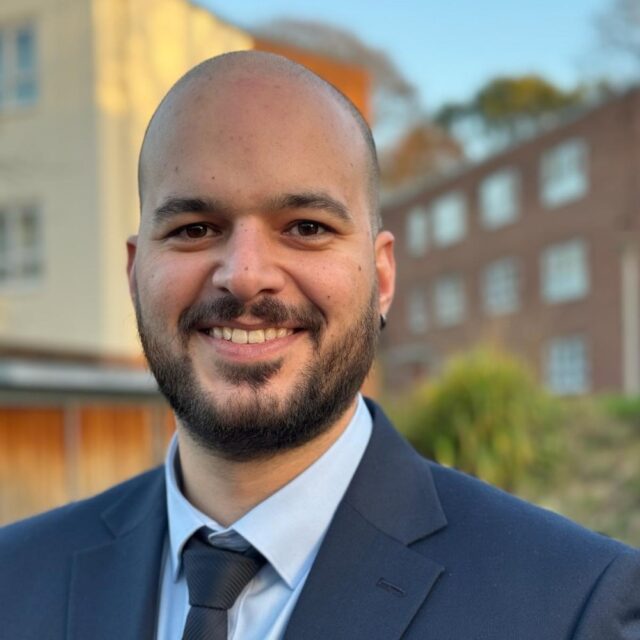 A headshot of Dr Theodoros