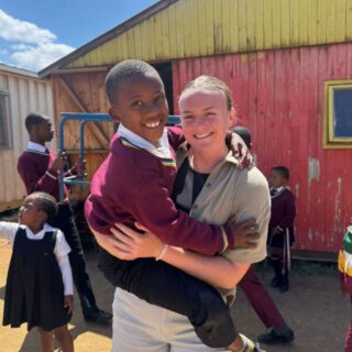 Kate James, sports graduate currently working in Ghana.