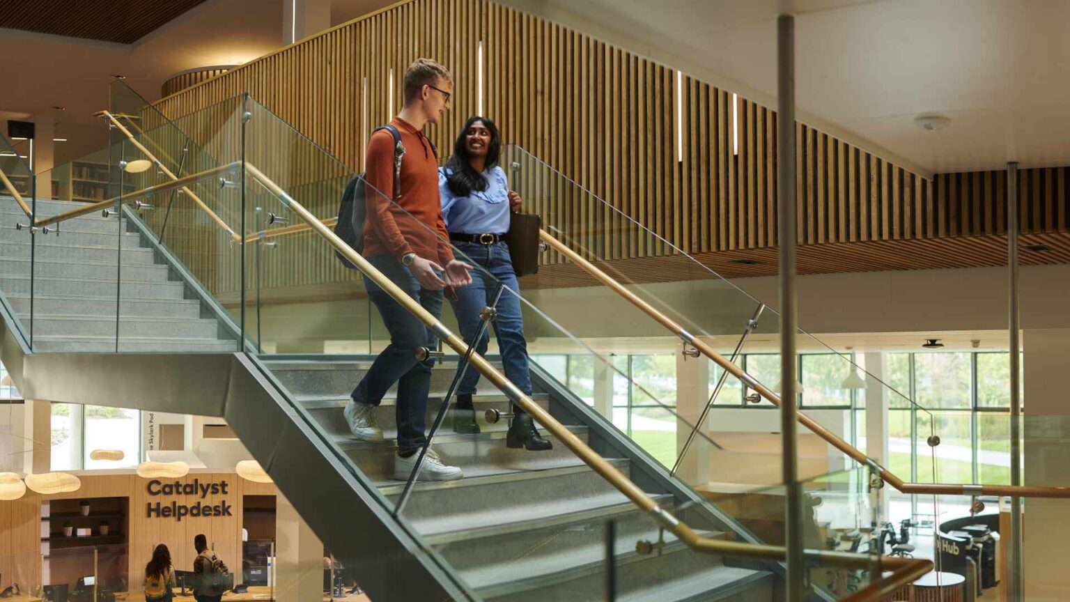Two students walk through the Edge Hill Catalyst
