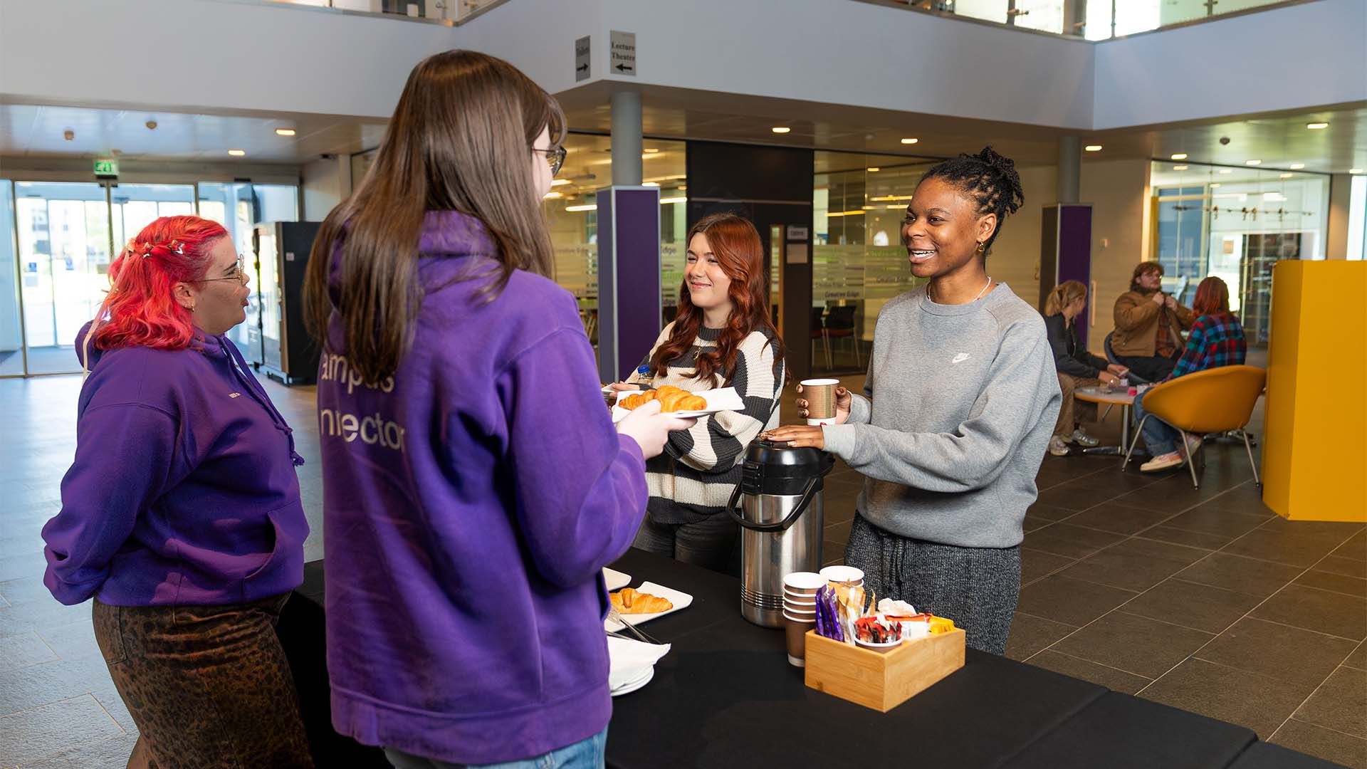 students at student life's commuter breakfast with campus connectors