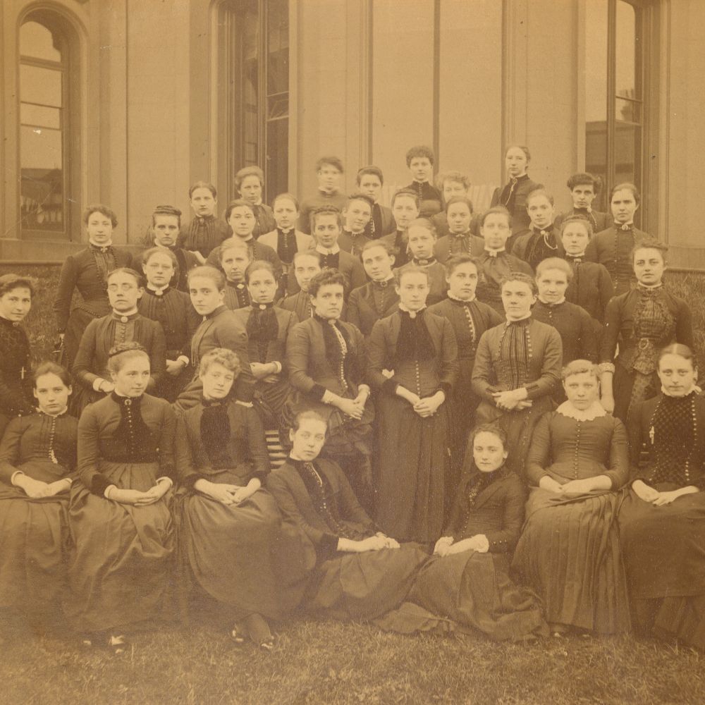 A sepia image of women students in the 1800s