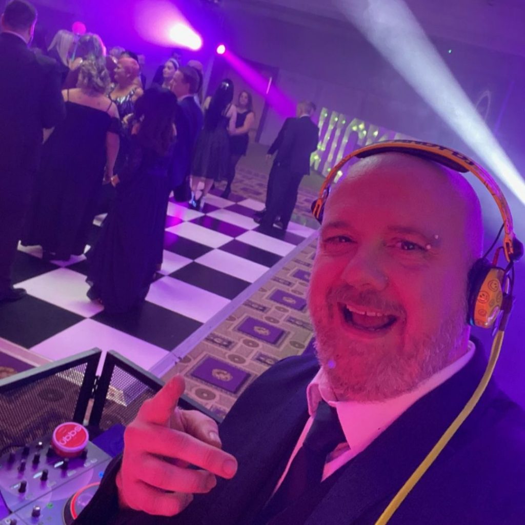 Andy Whiston DJing at a party