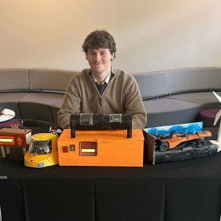 Lewis McLaughlin at the Computer Science End-of-Year Showcase presenting his project: HVAC micro-turbine energy harvesting system.