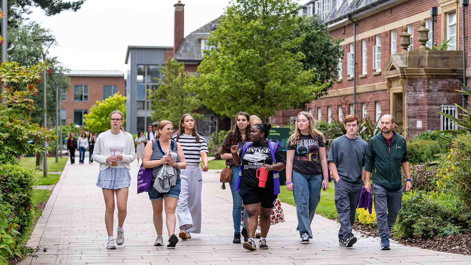 Visitors and supporters on a student-led campus tour at an Open Day.