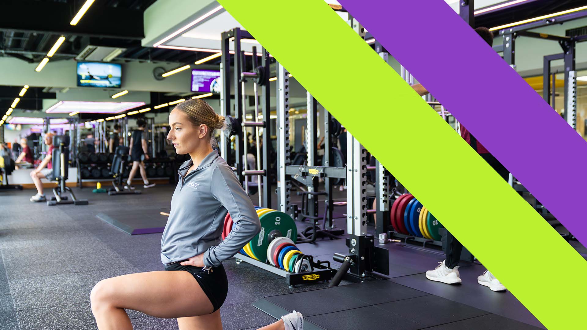 A student exercising in our fitness centre with our Edge Hill Sport double sash branding overlaid on the right hand side of the image