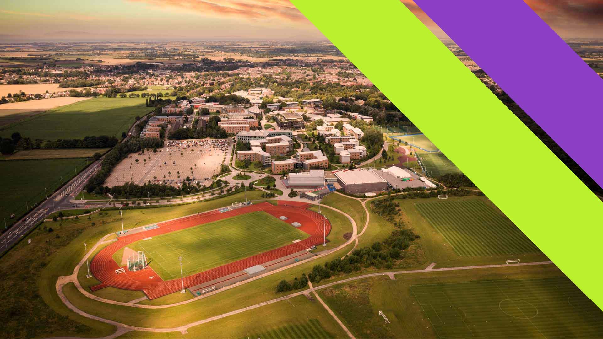 Aerial shot of our Ormskirk campus with the Sports Centre and our outdoor sports facilities in the foreground, our Edge Hill Sport double sash branding is overlayed on the right hand side of the image.