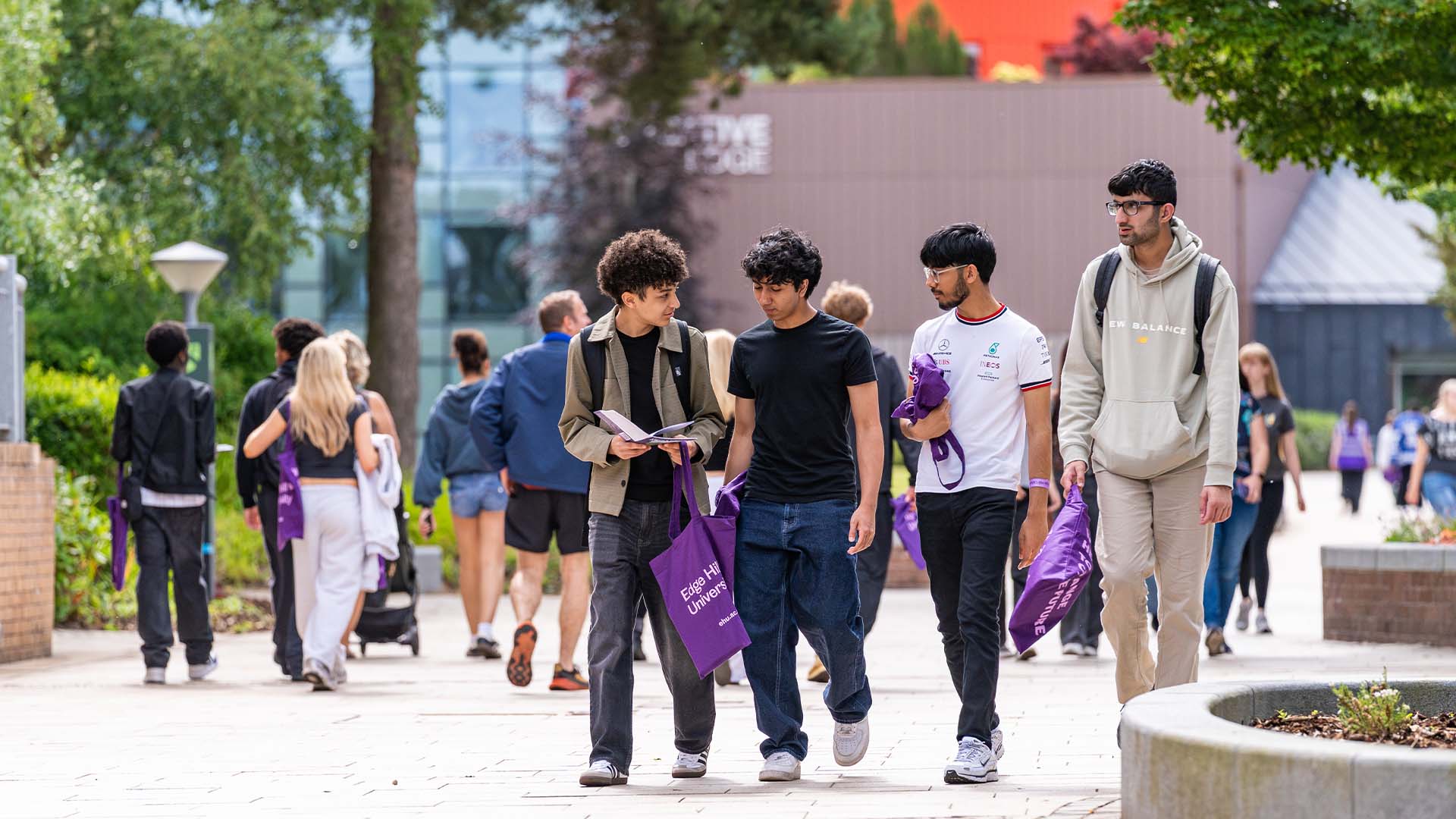Prospective students walking across campus at an Edge Hill Open Day.