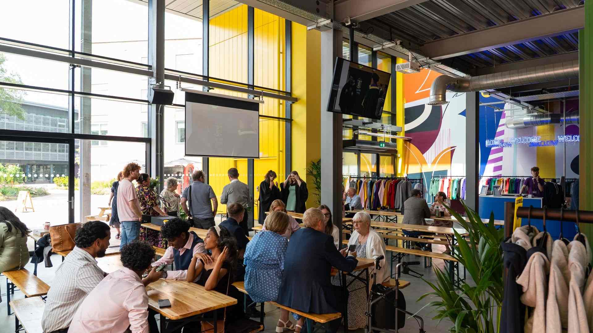 Image of people sat in the Student Union for an event