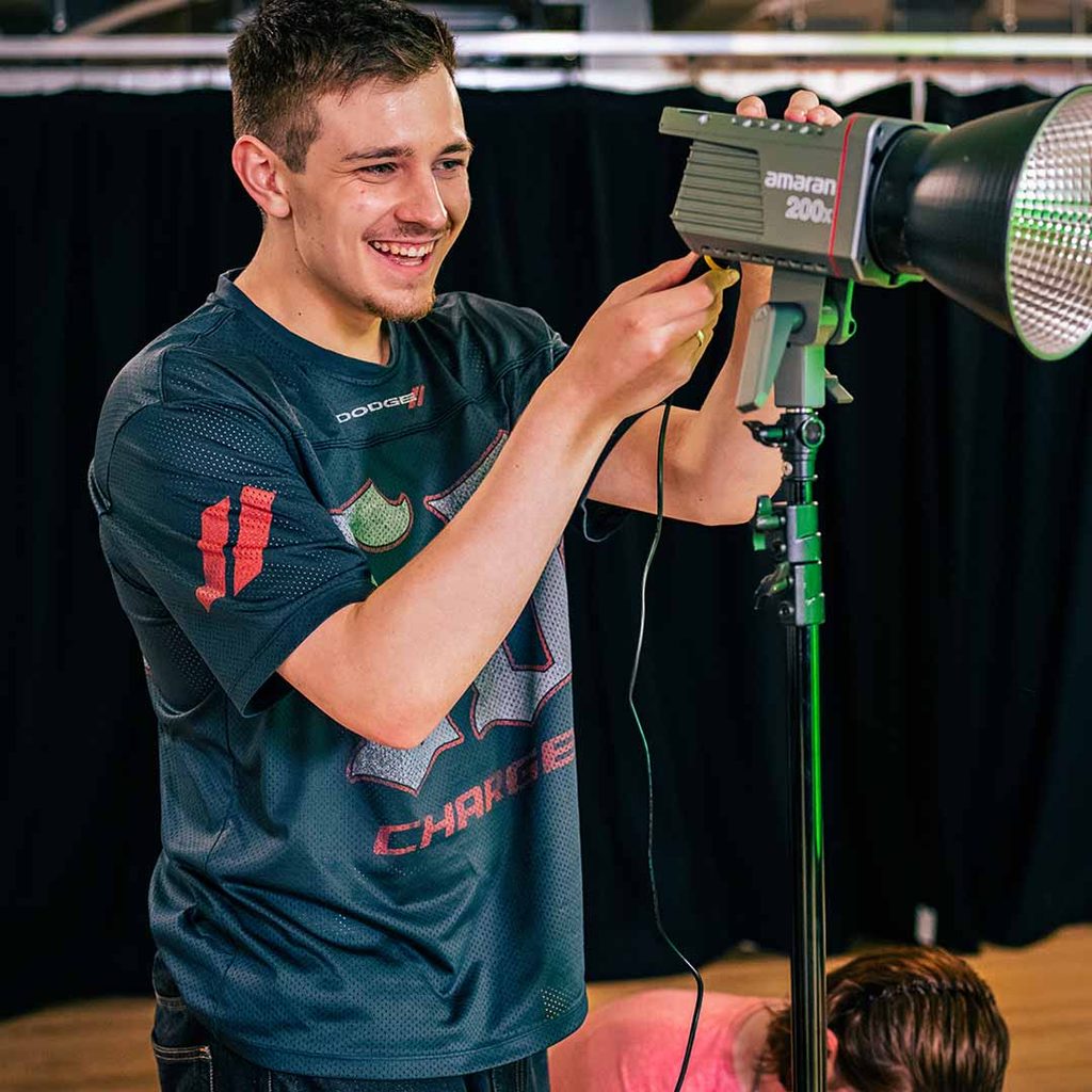 Josh sorts out thre lighting.