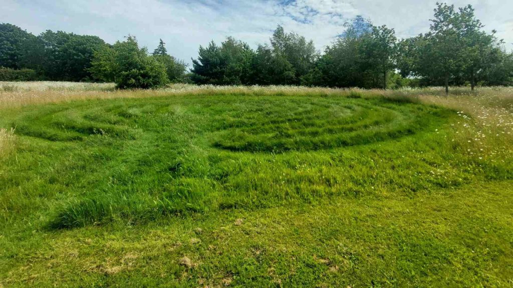 A Labyrinth cut into grass on the Edge Hill campus surrounding land.