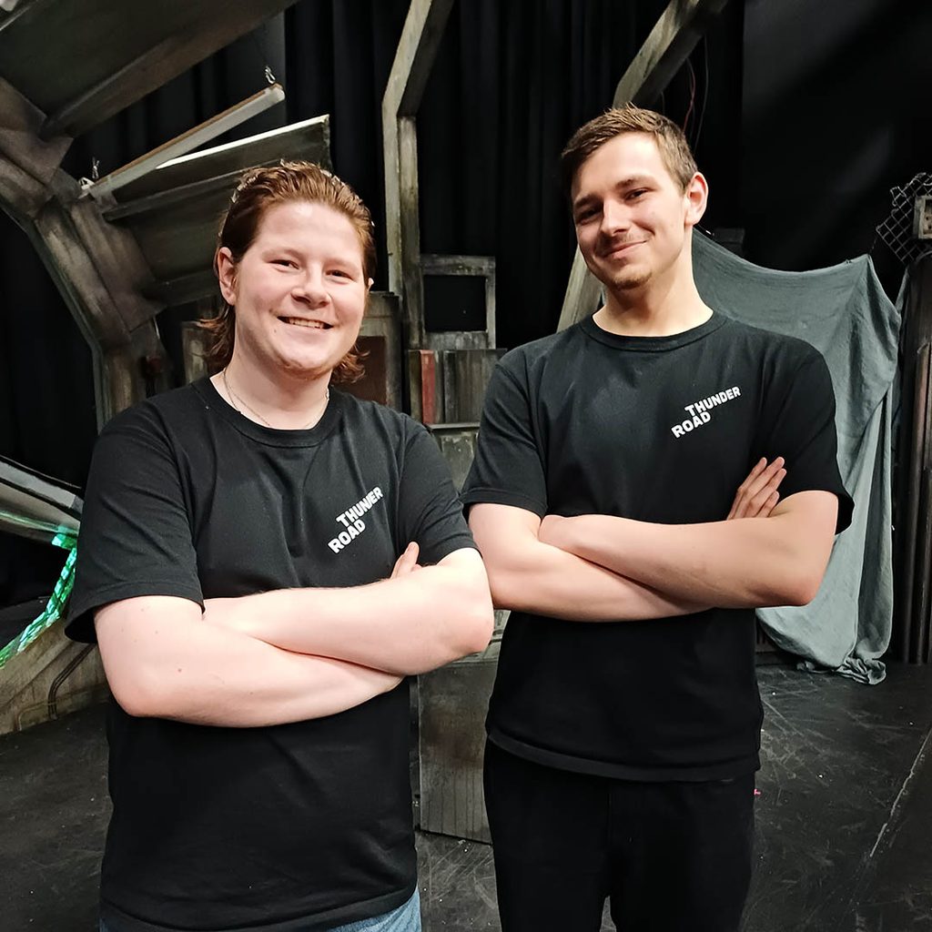 Nathan and Josh pose in front of the set of The Void.